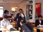 加古川YEGの事業報告をする玉川会長。